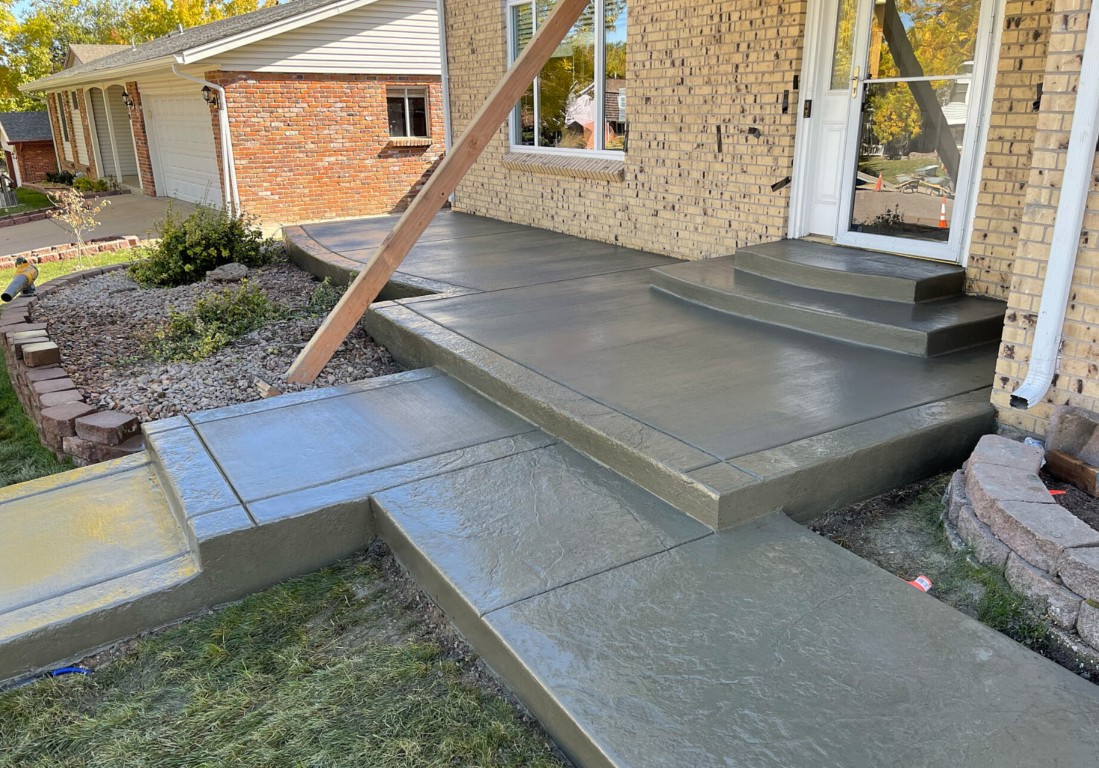Multi-level concrete steps and walkway installation for residential property in Oviedo, FL